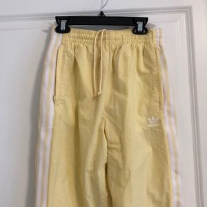 Yellow adidas pants